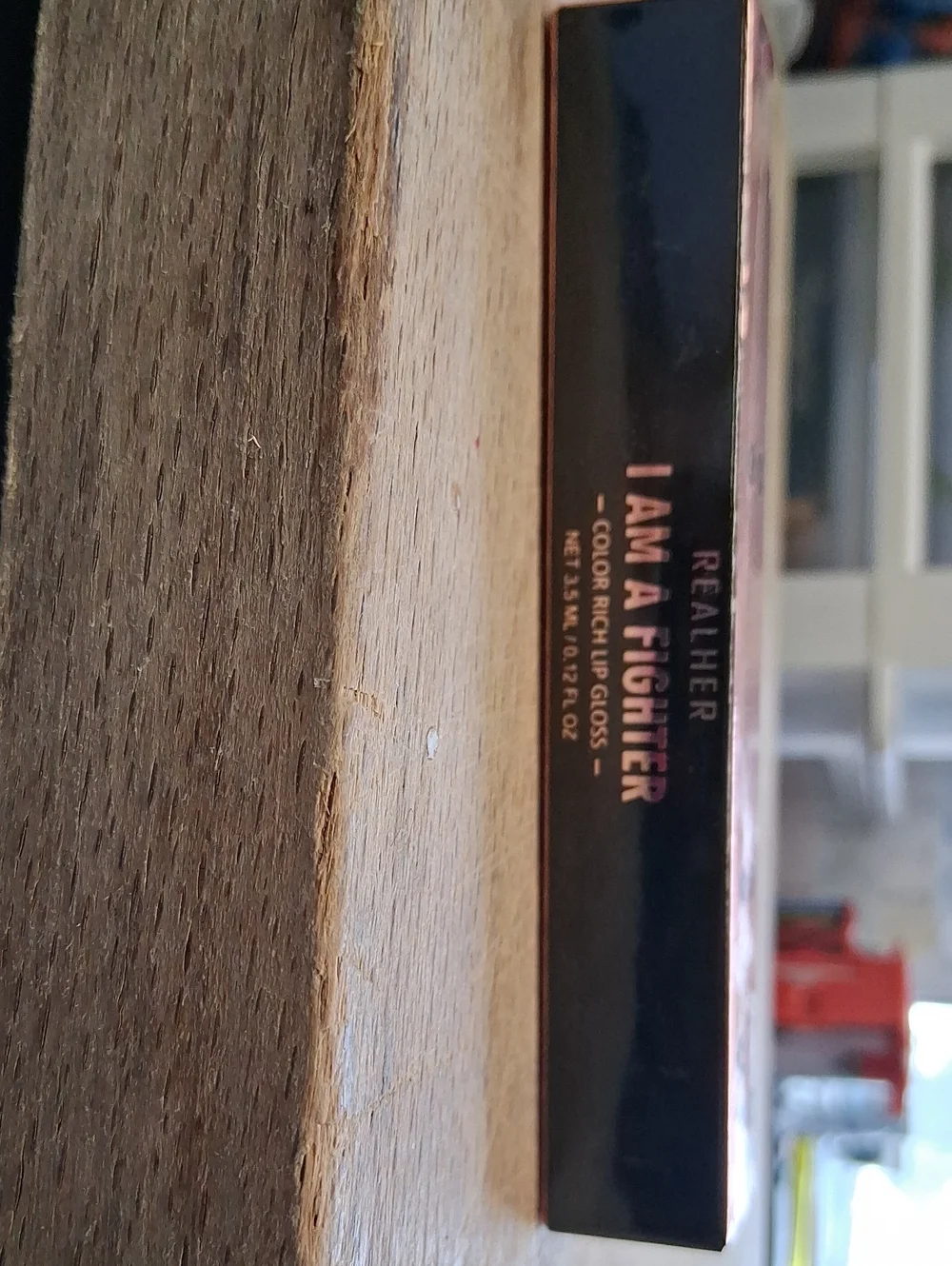 RealHer I Am A Fighter Lip Gloss - Black and Rose Gold Box
